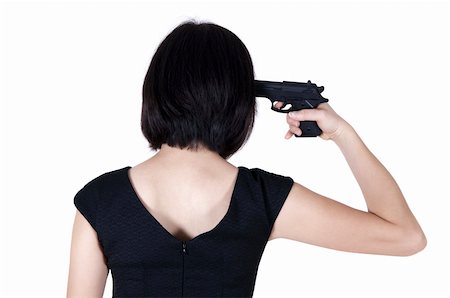 shooting the head with the hand - Woman with pistol pointing on her head, rear view isolated on white. Stock Photo - Budget Royalty-Free & Subscription, Code: 400-05229394