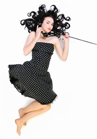 retro pin up girls - beautiful young woman girl talking on old phone isolated on white in studio Photographie de stock - Aubaine LD & Abonnement, Code: 400-05229897