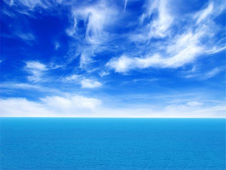 simsearch:400-04783475,k - cloudy blue sky above a surface of the sea Foto de stock - Royalty-Free Super Valor e Assinatura, Número: 400-05220533