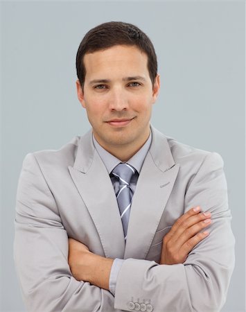 simsearch:400-05118165,k - Young businessman with folded arms in front of the camera Foto de stock - Royalty-Free Super Valor e Assinatura, Número: 400-05220572