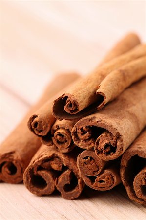 simsearch:400-04754857,k - Closeup of cinnamon sticks on a wooden table Stock Photo - Budget Royalty-Free & Subscription, Code: 400-05220750