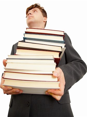 People  holding a large number of books on white Stock Photo - Budget Royalty-Free & Subscription, Code: 400-05221630