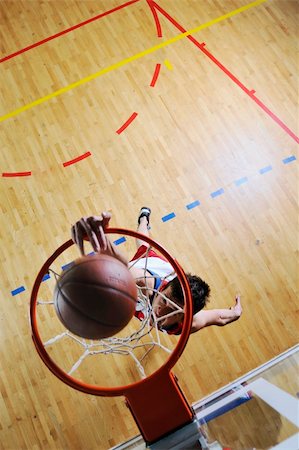 simsearch:400-04217948,k - young healthy man play basketball game indoor in gym Stock Photo - Budget Royalty-Free & Subscription, Code: 400-05221898