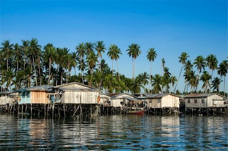 sabah - village of stilt houses built over the sea on mabul island malaysian borneo Stock Photo - Budget Royalty-Free & Subscription, Code: 400-05222509