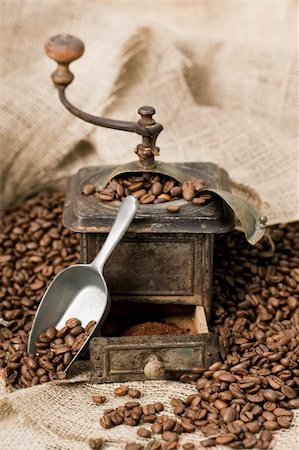 spoon antique - Antique coffee grinder filled with coffee beans Stock Photo - Budget Royalty-Free & Subscription, Code: 400-05222758