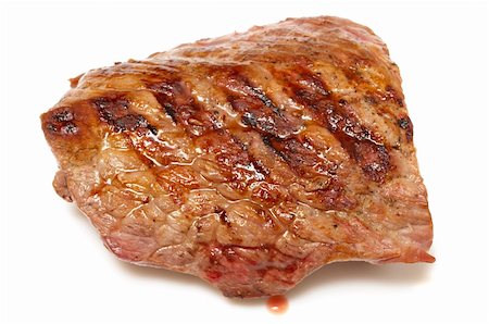Grilled beef steak isolated over white background Foto de stock - Royalty-Free Super Valor e Assinatura, Número: 400-05223736