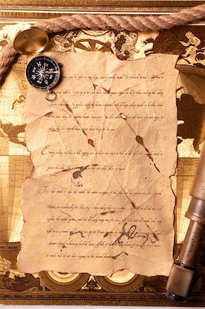 Old navigation equipment, old gold colours and treasure map Stock Photo - Budget Royalty-Free & Subscription, Code: 400-05234607