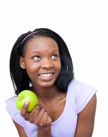 simsearch:400-04564052,k - Cute young woman eating an apple against a white background Foto de stock - Super Valor sin royalties y Suscripción, Código: 400-05235222