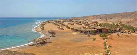 Panoramic view of a beach camp at a tropical resort Stock Photo - Budget Royalty-Free & Subscription, Code: 400-05236796