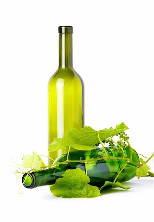 wine bottle and young grape vine branch Stock Photo - Budget Royalty-Free & Subscription, Code: 400-05237263