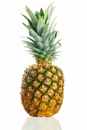 simsearch:400-04650758,k - Pineapple isolated on white standing on a reflective surface. Stock Photo - Budget Royalty-Free & Subscription, Code: 400-05237854