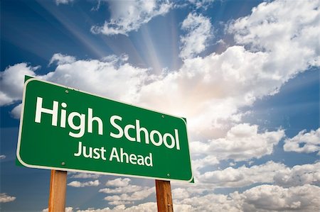 High School Just Ahead Green Road Sign with Dramatic Clouds, Sun Rays and Sky. Stock Photo - Budget Royalty-Free & Subscription, Code: 400-05237874
