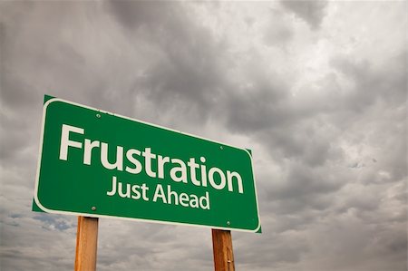 Frustration Just Ahead Green Road Sign with Dramatic Storm Clouds and Sky. Stock Photo - Budget Royalty-Free & Subscription, Code: 400-05237886