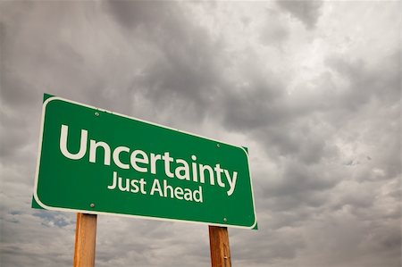 Uncertainty Just Ahead Green Road Sign with Dramatic Storm Clouds and Sky. Stock Photo - Budget Royalty-Free & Subscription, Code: 400-05237897