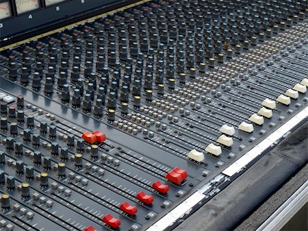 Detail of a soundboard mixer electronic device Foto de stock - Super Valor sin royalties y Suscripción, Código: 400-05238001