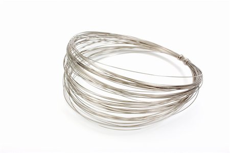 coil of steel wire on a white background Foto de stock - Super Valor sin royalties y Suscripción, Código: 400-05238524