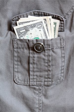 One dollar bank notes inside open khaki jacket pocket Stock Photo - Budget Royalty-Free & Subscription, Code: 400-05238638