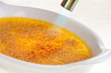 flame food torch - flame on a creme brulee Stock Photo - Budget Royalty-Free & Subscription, Code: 400-05239409