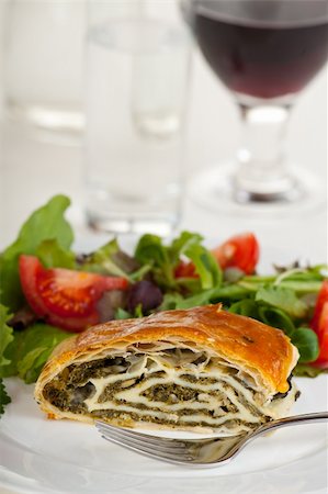 strudel - spinach strudel with fresh salad Stock Photo - Budget Royalty-Free & Subscription, Code: 400-05239410