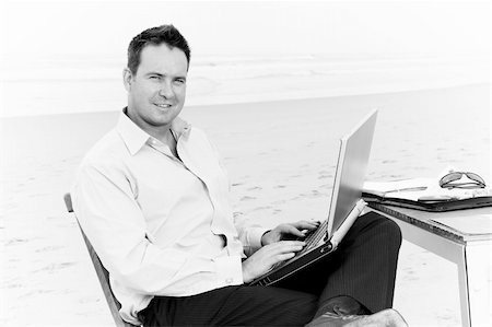 Business man with office on the beach Stock Photo - Budget Royalty-Free & Subscription, Code: 400-05239593