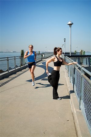 richscalzo (artist) - two females stretching on a pier Foto de stock - Super Valor sin royalties y Suscripción, Código: 400-05230763