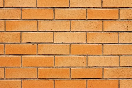 simsearch:400-06481727,k - Closeup image of an orange brickwall Foto de stock - Royalty-Free Super Valor e Assinatura, Número: 400-05230819