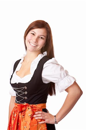 Portrait of young beautiful Bavarian woman in Oktoberfest Dirndl cloth. Isolated on white background. Foto de stock - Super Valor sin royalties y Suscripción, Código: 400-05230930