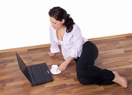 Young woman working at home Stock Photo - Budget Royalty-Free & Subscription, Code: 400-05231409