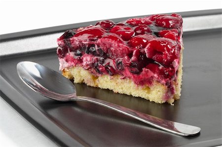 simsearch:400-06365777,k - Small berries tart piece macro shot over black plate Stock Photo - Budget Royalty-Free & Subscription, Code: 400-05231519