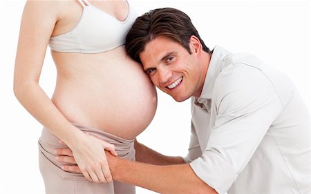 simsearch:400-07322828,k - Pregnant woman with her husband against a white background Fotografie stock - Microstock e Abbonamento, Codice: 400-05232298