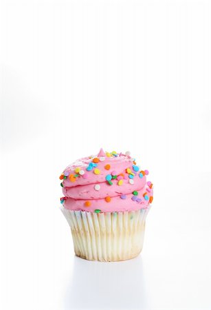 simsearch:400-04178778,k - vanilla cupcake with pink frosting vertical Foto de stock - Super Valor sin royalties y Suscripción, Código: 400-05232449