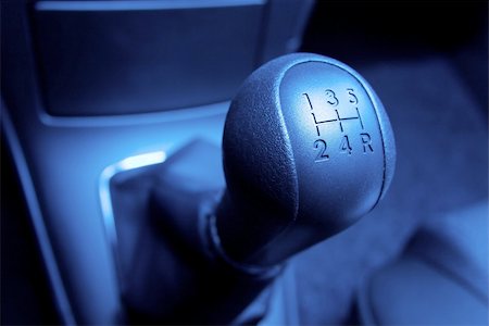 fast car close up - Closeup of the gearstick of a car, blue tone Stock Photo - Budget Royalty-Free & Subscription, Code: 400-05232688