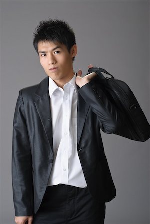 simsearch:400-04255435,k - Portrait of young business man of Asian with briefcase. Foto de stock - Super Valor sin royalties y Suscripción, Código: 400-05233344