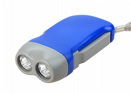 simsearch:400-08187651,k - Single blue-gray hand flashlight. Isolated on white. Close-up. Studio photography. Fotografie stock - Microstock e Abbonamento, Codice: 400-05233634