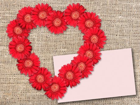 simsearch:400-06095720,k - Bouquet of red flowers as heart-form with message-card on  textile background. Close-up. Studio photography. Stock Photo - Budget Royalty-Free & Subscription, Code: 400-05233834