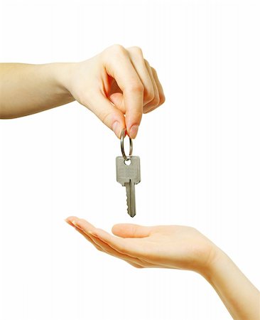 simsearch:400-05038040,k - hand holds a key isolated on white Photographie de stock - Aubaine LD & Abonnement, Code: 400-05244075