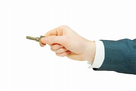 simsearch:400-04350998,k - hand holds a key isolated on white Stock Photo - Budget Royalty-Free & Subscription, Code: 400-05244116