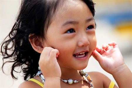 simsearch:400-06389659,k - Portrait of the beautiful small Asian girl. Indonesia. Java Stock Photo - Budget Royalty-Free & Subscription, Code: 400-05244876