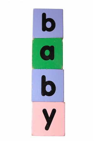simsearch:400-05246310,k - assorted childrens toy letter building blocks against a white background that spell baby with clipping path Stock Photo - Budget Royalty-Free & Subscription, Code: 400-05246298