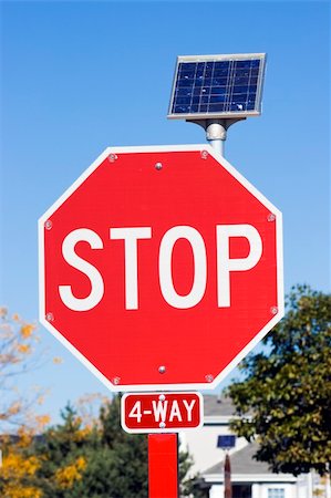 solar power usa - STOP sign powered by a solar battery.  USA. Foto de stock - Super Valor sin royalties y Suscripción, Código: 400-05246497