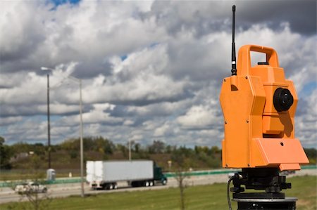 simsearch:400-04710606,k - Survey on the highway - orange theodolite. Stock Photo - Budget Royalty-Free & Subscription, Code: 400-05246541