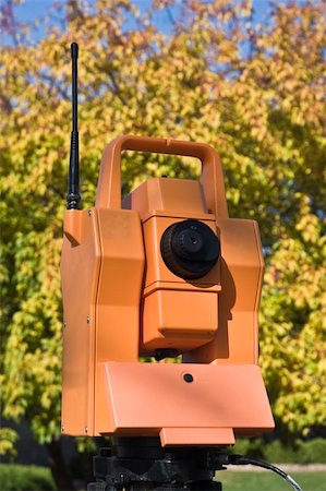 simsearch:400-04710606,k - Surveying during colorful fall - orange theodolite. Stock Photo - Budget Royalty-Free & Subscription, Code: 400-05246550