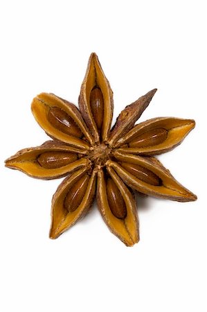 deco food - closeup of one star anise on white background Stock Photo - Budget Royalty-Free & Subscription, Code: 400-05246893