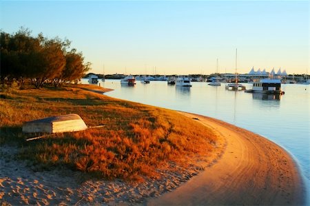 simsearch:400-05255037,k - Houseboats and yachts moored in the Broadwater Gold Coast Australia on a golden morning. Stock Photo - Budget Royalty-Free & Subscription, Code: 400-05247028