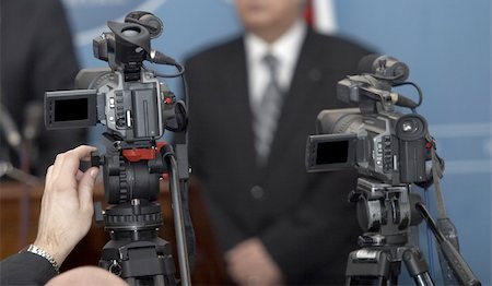 close up of conference meeting and broadcasting camera Stock Photo - Budget Royalty-Free & Subscription, Code: 400-05247594