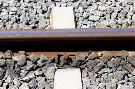 simsearch:400-05247494,k - iron rusty train railway detail over dark stones rail way Photographie de stock - Aubaine LD & Abonnement, Code: 400-05248171