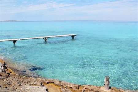 simsearch:400-04709015,k - Formentera Illetes turquoise sea wooden pier aged trunk Illetas Stockbilder - Microstock & Abonnement, Bildnummer: 400-05248196