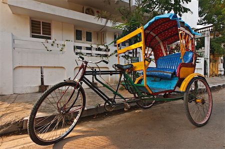 Empty bicycle rickshaw in street. Pondicherry, South India Stock Photo - Budget Royalty-Free & Subscription, Code: 400-05248290