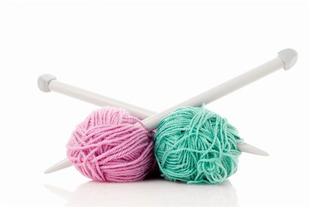 Balls of green and pink  knitting wool or yarn, with silver knitting needles. Stock Photo - Budget Royalty-Free & Subscription, Code: 400-05249777