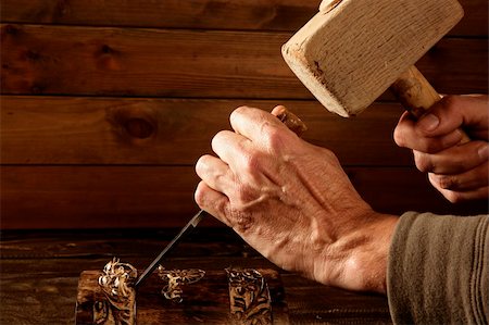 picture of old man construction worker - gouge wood chisel carpenter tool hand hammer craftman Stock Photo - Budget Royalty-Free & Subscription, Code: 400-05240209